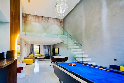 Duplex à Oliver Palm avec piscine & salle de sport